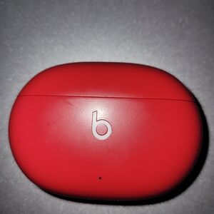 Beats Red Wireless Earbuds Case And Earbuds Inside